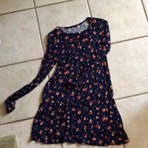 navy dress with orange flowers